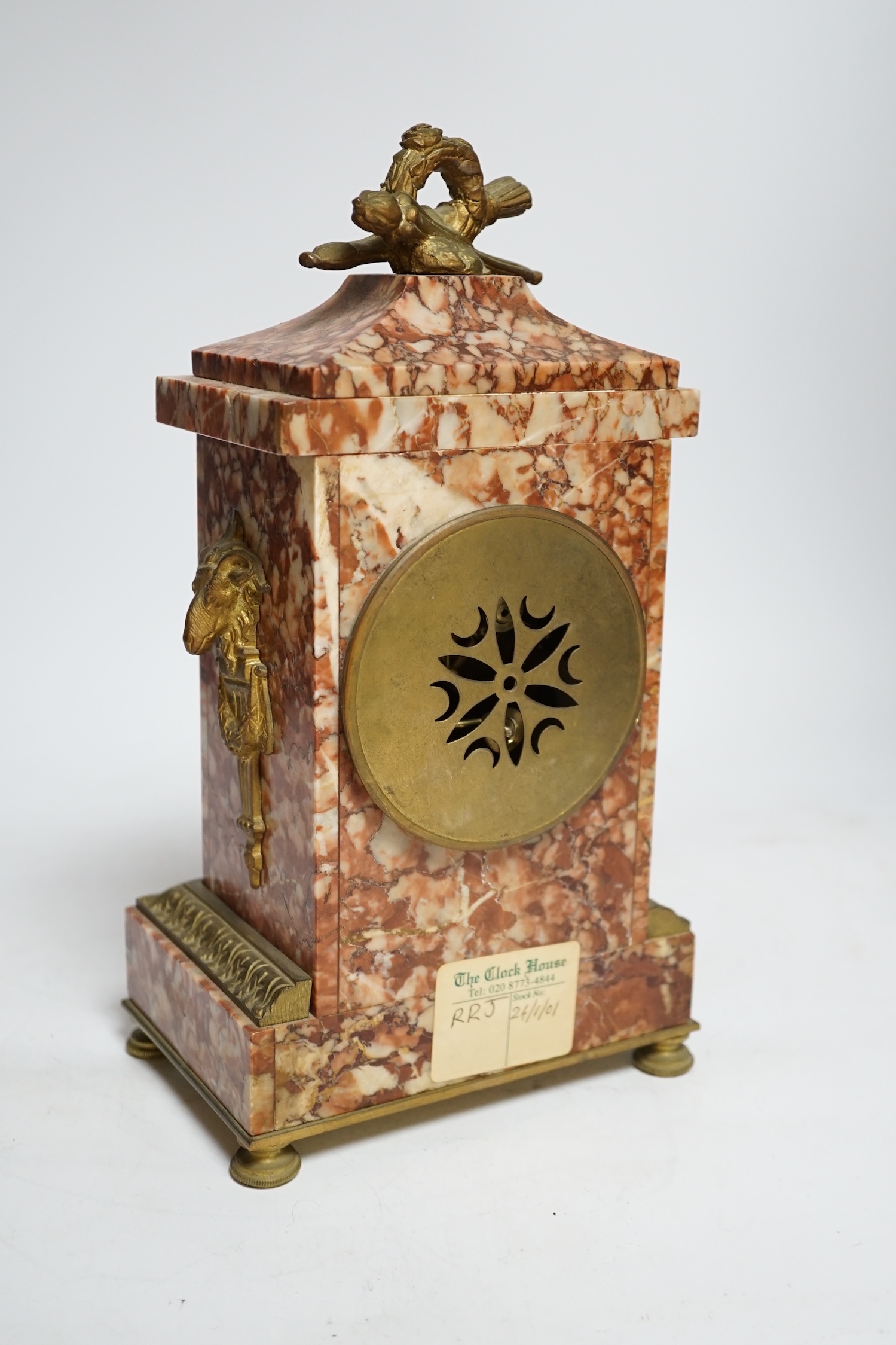 A mid-19th century rouge marble mantel clock, L. Marti et Cie Medaille D’argent two train movement, striking on a bell (bell missing), 29.5cm